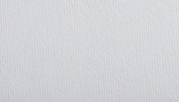 close-up of white textured watercolor paper with vertical ridges and fine patterns for art backgrounds, stationery, and craft designs photo