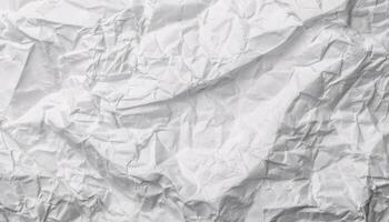 close-up of crumpled white paper texture with intricate folds and wrinkles for creative backgrounds photo