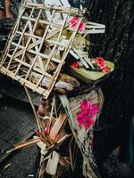 Sanggah cucuk is a small shrine placed on the roof of Balinese houses, symbolizing protection and honor to deities. It's typically made of wood and adorned with intricate carvings photo
