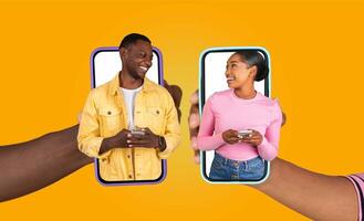 A married couple engages in a joyful conversation using their smartphones, sharing laughter and affection while connected through technology. Their interaction highlights modern relationships. photo
