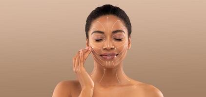 A woman indulges in a skincare routine, applying a facial treatment while enjoying a moment of self-care. Her serene expression highlights the importance of beauty and relaxation. photo