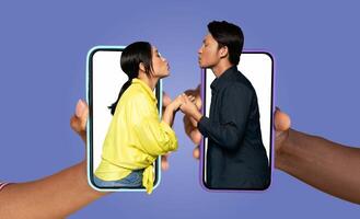 A couple showcases their relationship by interacting through smartphones, highlighting modern communication and connection. Their playful gestures symbolize love and togetherness in a digital age. photo