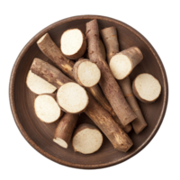 Freshly cut cassava roots placed neatly in a rustic wooden plate against a clear transparent background for a healthy culinary display, Cassava in plate on transparent background png