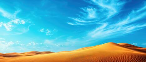 A desert landscape with a blue sky and clouds photo