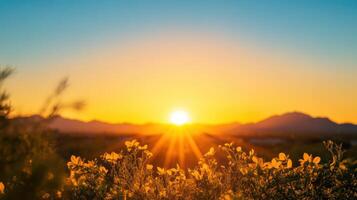 A beautiful sunset with a mountain range in the background photo