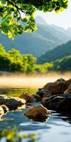 A beautiful mountain landscape with a lake and a tree photo