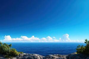 A beautiful blue sky with a few clouds and a large body of water photo