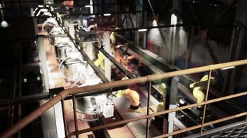 Automated conveyor system in a factory during production process at night video