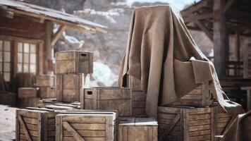 Wooden crates covered with a cloth in a rustic outdoor setting during daylight video