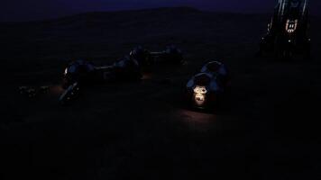 Mars colony base illuminated during nighttime exploration activities video