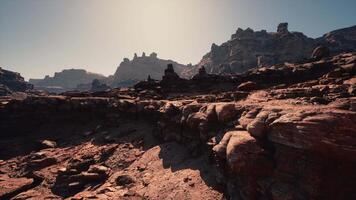 A rocky area with rocks and a mountain in the background video