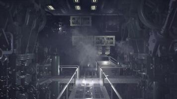 A complex array of machinery fills the space, illuminated by subdued lights video