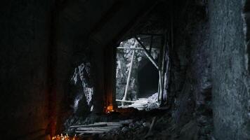 Mysterious underground tunnel with candles illuminating the path video