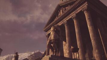 Ancient temple with towering columns showcases historic statue at sunset video