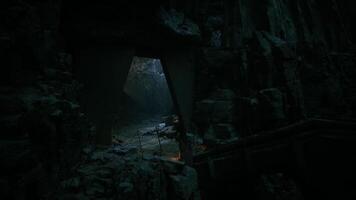 Dark cavern with a narrow opening revealing light from above video