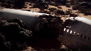Major aircraft collision results in wreckage scattered across desert landscape video