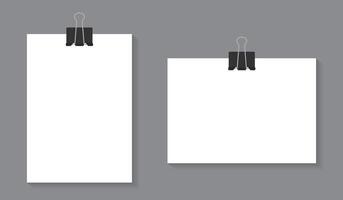 Paper sheet hanging on a clip. Blank white poster template vector