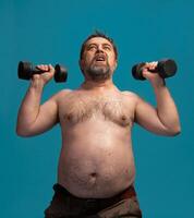Elderly man lifts dumbbells for strength training in home gym setting photo