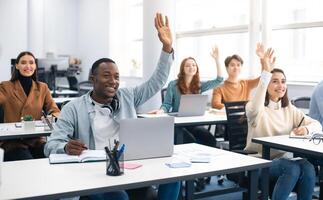 Presentation, Convention Concept. Portrait of smiling international people participating in seminar at modern office, raising hands up to ask question or to volunteer, diverse group sitting at tables photo