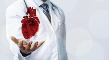 Healthcare Concept. Closeup of doctor in white coat holding virtual heart in open palm, copy space photo