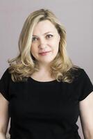 Portrait of a middle age woman in the room photo