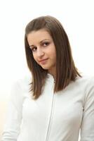 Young girl portrait in white photo