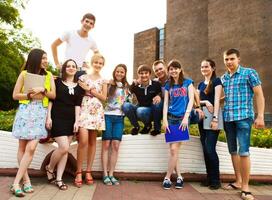 Group of students or teenagers with notebooks , many photo
