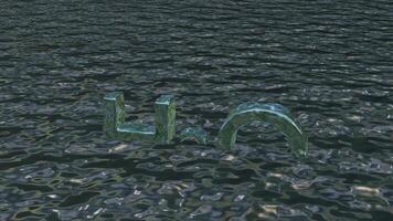 Calm water with H2O symbol floating on the sea surface video