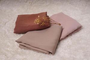 Beautiful and soft hijab fabric as a background for Pro Photos. photo