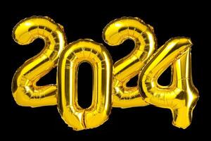 New Year 2024 celebration Golden Yellow foil color balloons. 2024 balloons Isolated black background photo