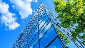 Sophisticated architectural style with glass and a natural backdrop photo