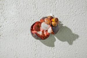 Opened Ripe mangosteen fruit isolated on a white background photo
