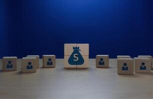 Teamwork, corporate financial goals, performance is profit photo