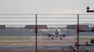 Aircraft take off, view from the end of the runway. Retracting, closing the chassis. Tourism and travel concept video