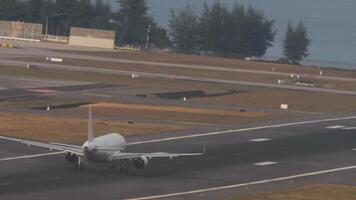 PAssenger airplane with an unrecognizable livery takes off. Flight departure. Sea in the background video