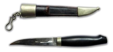 Unique antique dagger with ornate scabbard showcasing craftsmanship from a bygone era photo