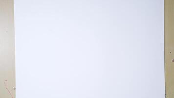 Caucasian male hands aligning blank paper on desk creativity preparation in minimalist workspace. video