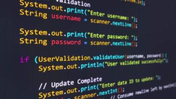 Code animation, animated colorful code scrolling on a realistic monitor screen is suitable for footage software development, coding scenes, and typing hacking scripts. video