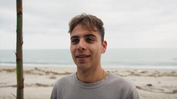 Exhausted Boy Satisfied With A Success Smiles Happily At The Beach In Nature video