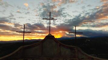 Silhouette of Three Christian Religious Crosses in Front of a Sunset Sky Symbol video