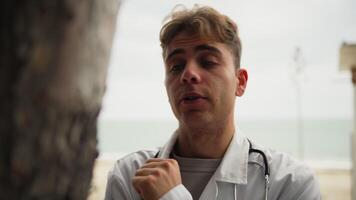 Technician Talks To The Trunk Of A Tree Like A Crazy Person In The Park video
