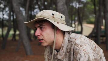 Soldier Tired Of Running He Remarries Behind The Trunk Of A Tree In The Forest video