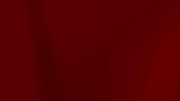 Dark red blurry plain background suitable for use in design projects, presentations, website backgrounds, social media graphics, and artistic creations. video