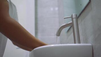 man washing his face in the morning video