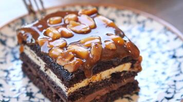 Indulgent Decadent Chocolate Cake topped with Nuts and Drizzled Caramel video