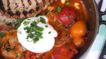 Poached eggs with sausage and toast video