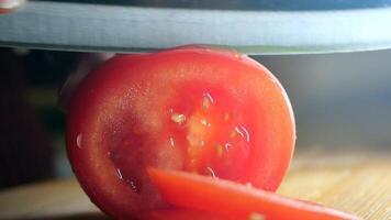 Fresh Tomato Sliced with a Sharp Knife on Wooden Cutting Board video