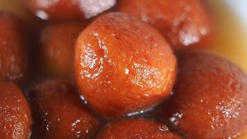 slow motion of fork pick gulab jamun video