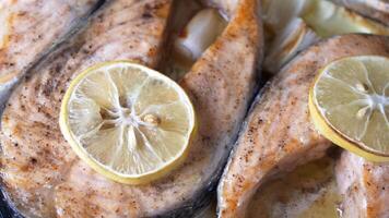 Baked salmon with lemon and onions video