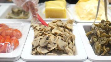 An Extensive Variety of Condiments and Toppings Available for Dishes video